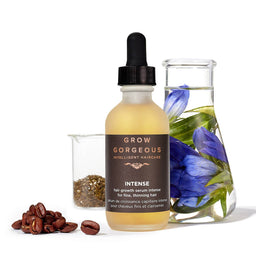 Grow Gorgeous Hair Growth Serum Intense with a pile of coffee beans and petals next to the bottle