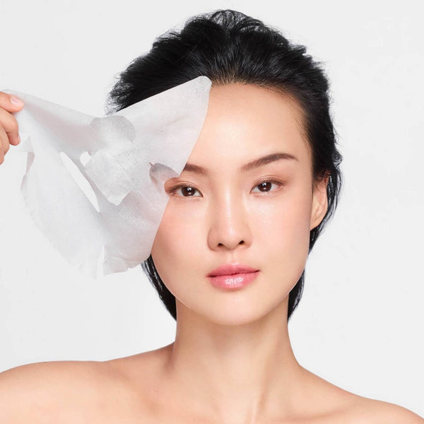 Vichy Minéral 89 Instant Recovery Sheet Mask being peeled off face