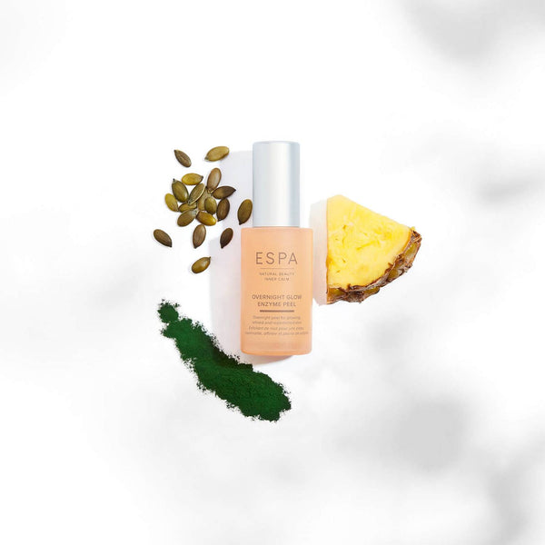 ESPA Overnight Glow Enzyme Peel surrounded by its natural ingredients 