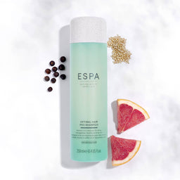 ESPA Optimal Hair Pro-Shampoo and ingredients surrounding the bottle