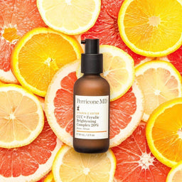 Perricone MD Vitamin C Ester CCC + Ferulic Brightening Complex 20%on a bed of oranges
