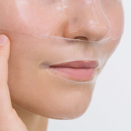 closeup of a women's face with a mask applied