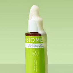Image Skincare BIOME+ Dew Bright Serum with the contents overpouring from the spout 