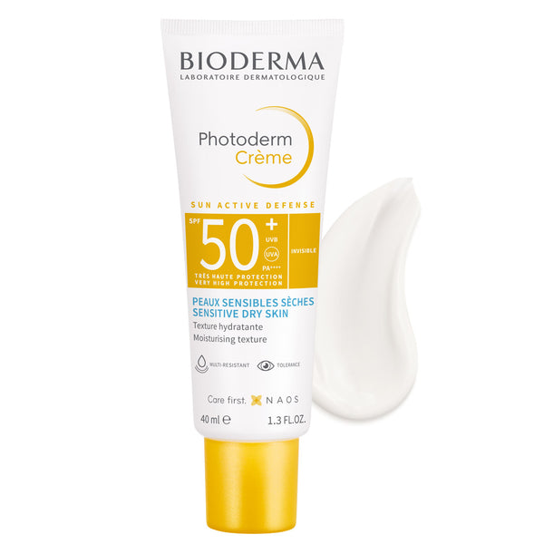 Bioderma Photoderm Crème SPF 50+ for Dry Sensitive Skin with its contents behind it