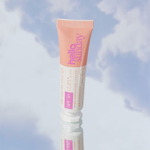 Hello Sunday The One For Your Lips SPF50 Lip Balm on a mirror facing the sky