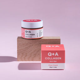Q+A Collagen Face Cream on a wooden block