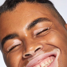 a closeup of a mans face