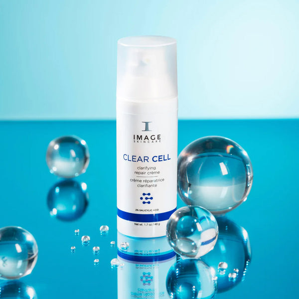 Image Skincare Clear Cell Clarifying Repair Crème surrounded by 4 clear orbs