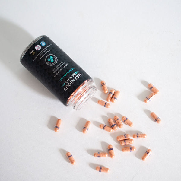 INGENIOUS Beauty Ultimate Collagen+ Second Generation 90 Capsules tub with the capsules scattered in front of it
