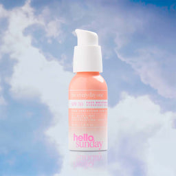 Hello Sunday The Everyday One Face Moisturiser SPF50 bottle amongst the clouds 