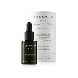 Dark green Wildsmith Skin Active Super Oil 30ml  bottle next to white box
