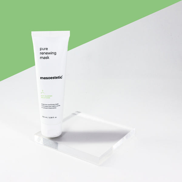 mesoestetic Pure Renewing Mask on glass slate with green background