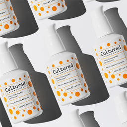 A collection of Cultured Biomecare Vitality Cleansing Milk neatly arrange
