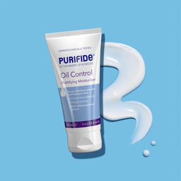 Purifide Daily Moisturiser SPF 30 laid on top of its texture