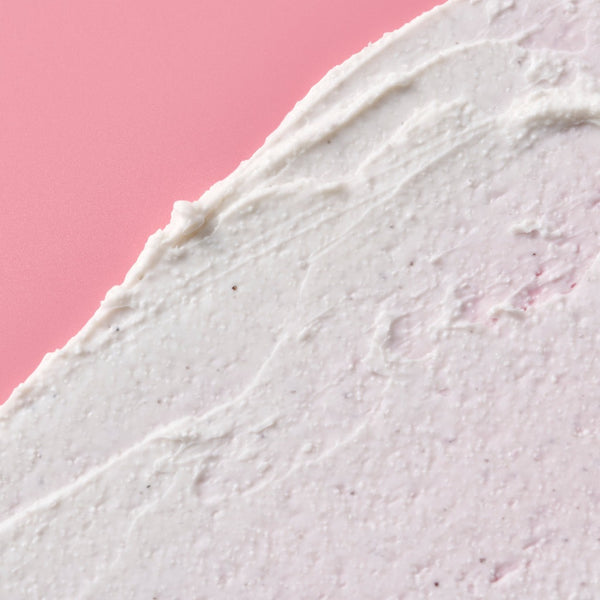Facial scrub up close image of the creamy texture with microbeads
