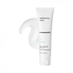 A tube of mesoestetic Brightening Foam with its contents poured behind it