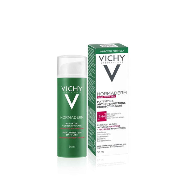 Green Vichy Normaderm Skin Corrector 1.5% Salicylic Acid Daily Moisturiser For Blemish-Prone Skin 50ml next to white box